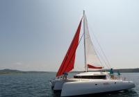 hoisting gennaker sail on neel 45 multihull yacht
